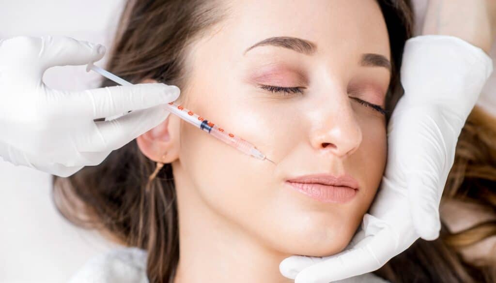 woman receiving juvederm injection