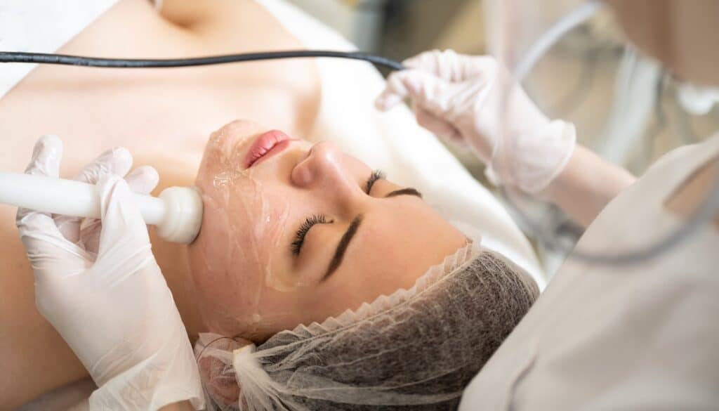 woman receiving venus freeze skin tightening facial